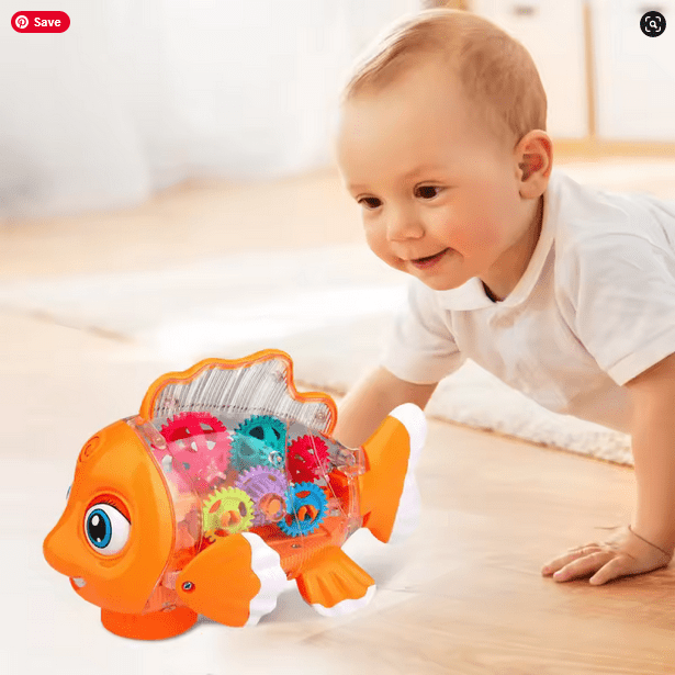 baby is playing with transparent fish car